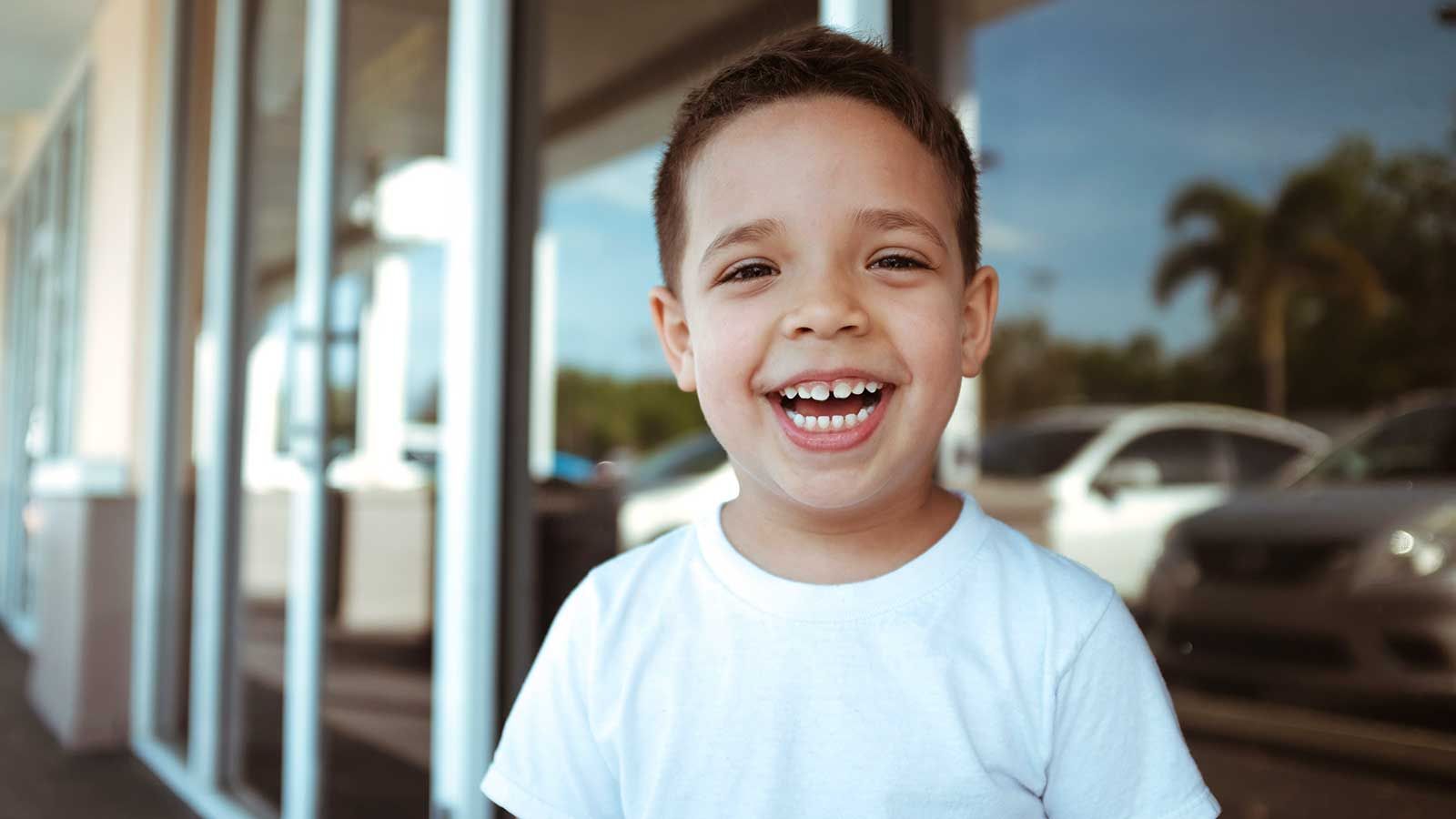 Child smiling after dental visit