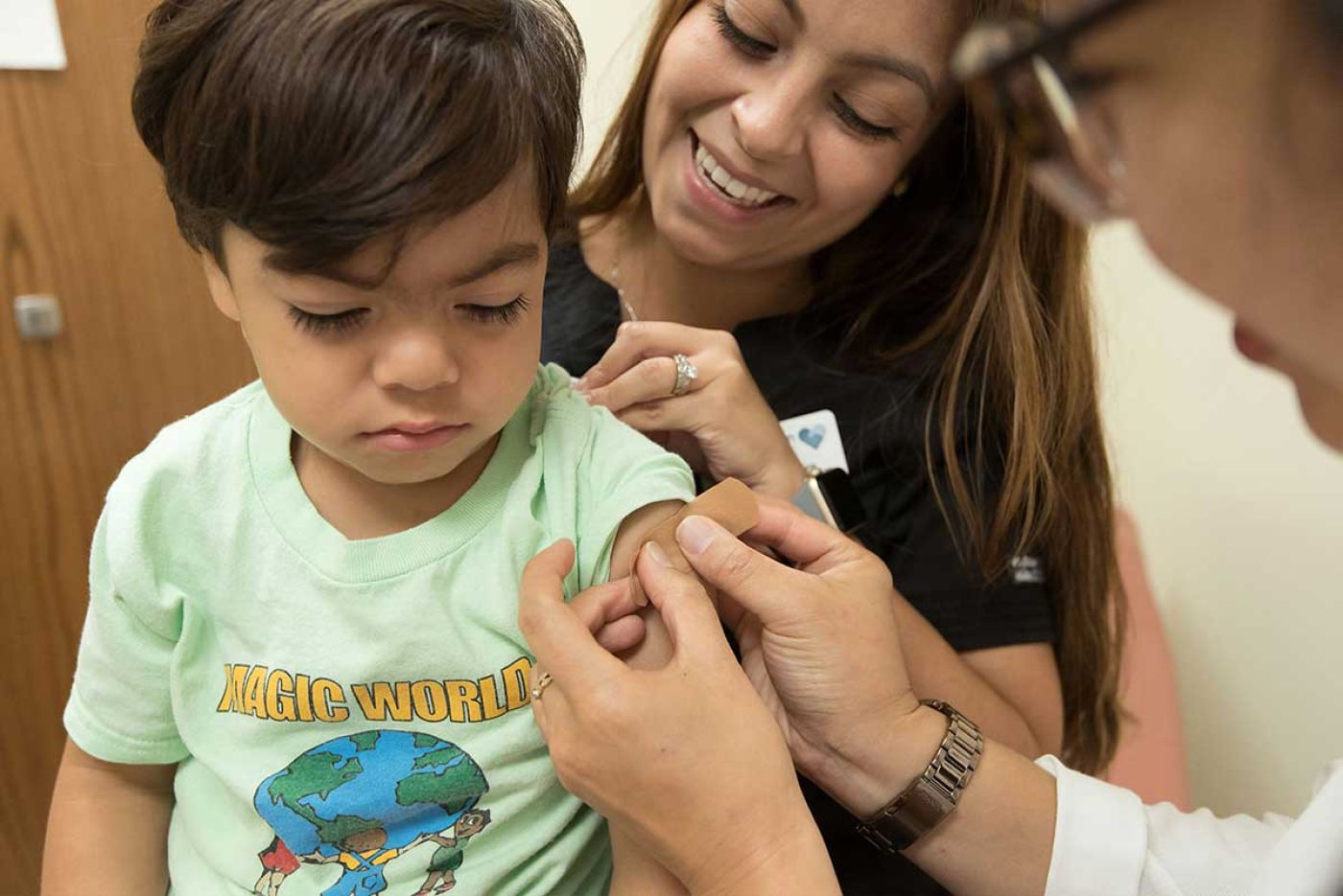 a picture of a kid received a vaccine